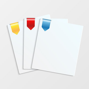 Sheets of white paper with colorful bookmarks and place for your