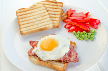 Fresh breakfest - ham, eggs, vegetable and toast