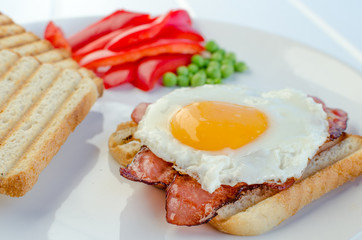 Fresh breakfest - ham, eggs, vegetable and toast