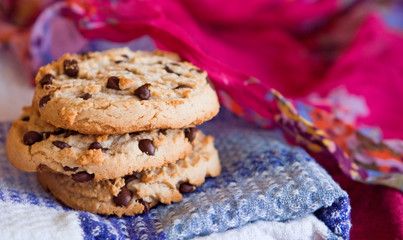 Oatmeal cookies on a pink, blue, white background