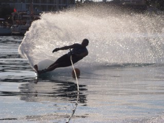 man waterskiing slalom on sea in Greece