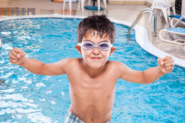 Boy at the swimming pool