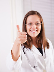 Doctor showing thumbs up sign