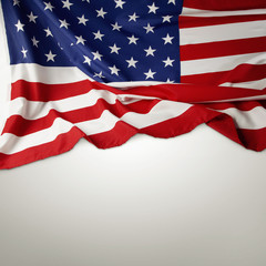 Obraz premium American flag on grey background. Copy space