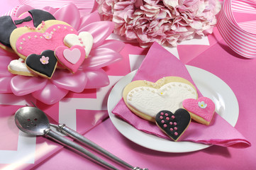Obraz na płótnie Canvas Wedding party bride and groom pink & white cookies