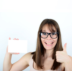 Portrait of beautiful young female making CALL ME gesture and ho