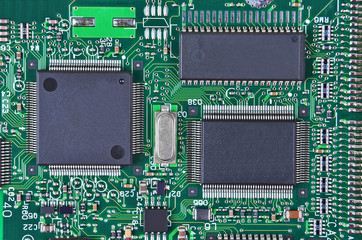 Close up of a printed green computer circuit board