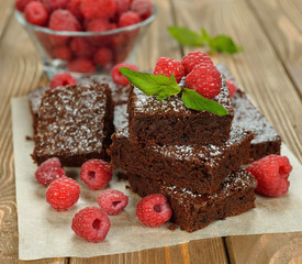 Chocolate brownies with raspberries