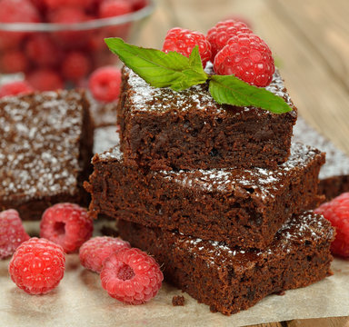Chocolate brownies with raspberries
