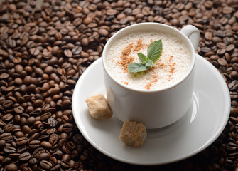 white coffee cup with mint and brown sugar