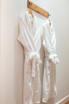 Bathrobes hanging on the wall