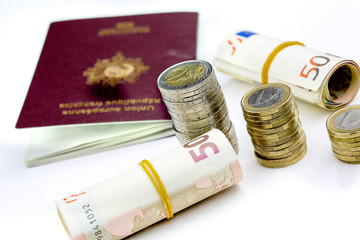 Passport and currency focuses on Euro banknotes