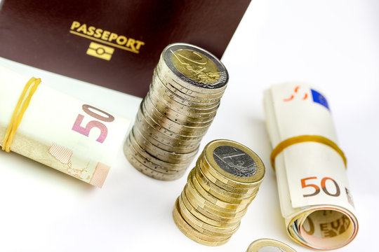 Passport and currency focuses on Euro banknotes