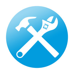 Etiqueta redonda martillo y llave inglesa