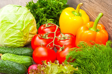 ripe vegetables on a wooden background, close up