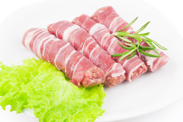 Rolls of bacon and meat closeup