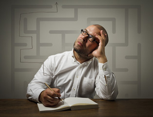 Man in white and maze.