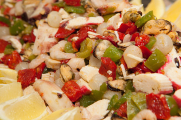 seafood salad with prawns, peppers and onions