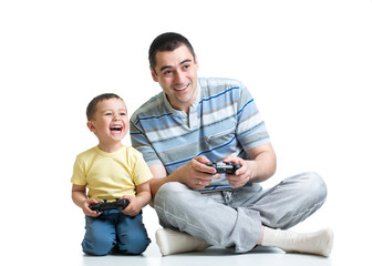 kid boy and his dad playing with a playstation together