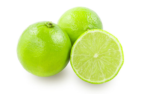 Two whole limes and lime slice