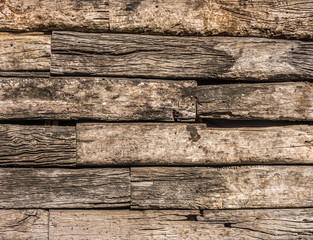 Wooden logs wall of rural house for background and texture