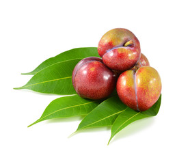 plums isolated on white