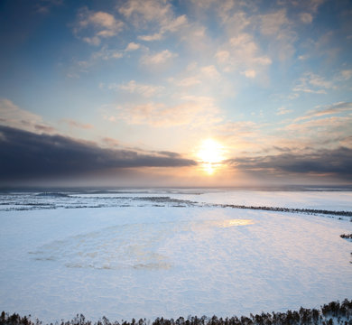 Sunset Above Frozen Lake