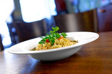Delicious pasta on white plate