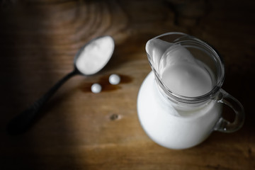 Dairy products on wooden table background