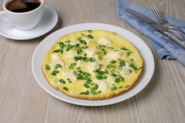 Omelet with feta cheese and green onions
