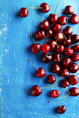Fresh cherries on a rustic kitchen table