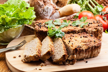 Traditional delicious meat pate with vegetables