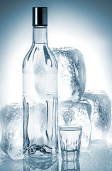 Bottle of vodka and ice cubes