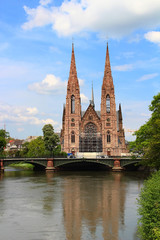 Fototapeta na wymiar St. Paul's Church and Ill river, Strasbourg, France