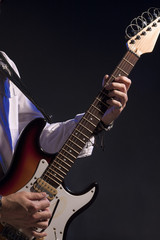 Closeup of Hands of Male Guitar Player