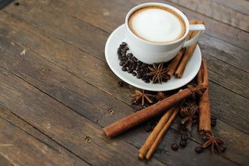 Composition with white cup of coffee