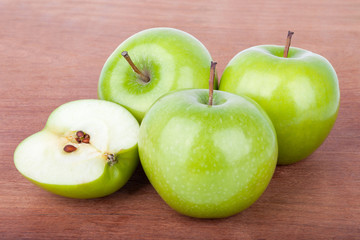 Fresh Green apples on the wooden table