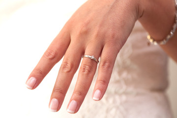 Engagement ring. French manicure.