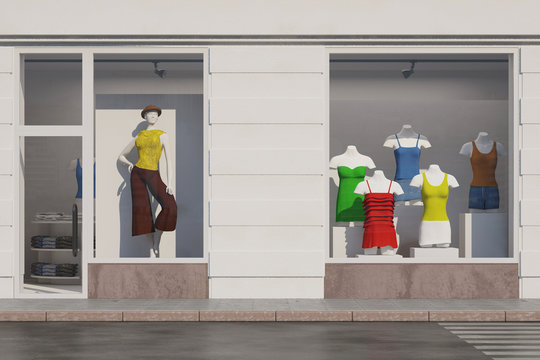 Schaufenster von Modeladen mit Puppen