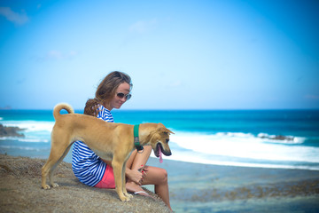 Girl Sitting on the Beach