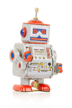 Robot vintage toy on white, clipping path