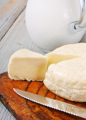 Dairy products on wooden background.