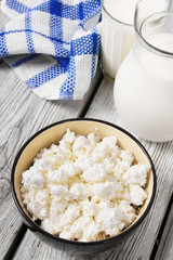 Dairy products on wooden background.