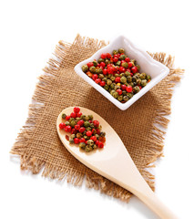 Pepper and wooden spoon.