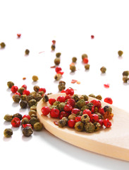 pepper on wooden spoon