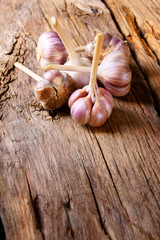 Garlic on wood.