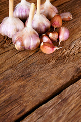 Garlic on wood.