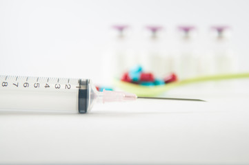 Disposable Syringe and medicine background