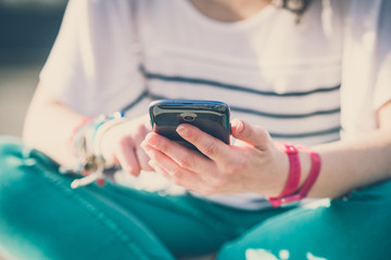 close up of hands woman using smart phone