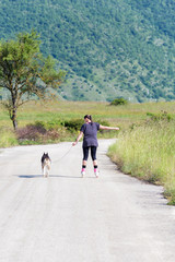 Inline skating with dog
